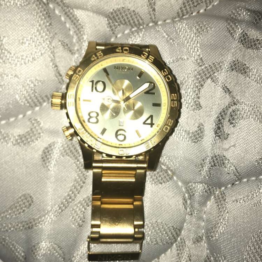 Nixon watch.